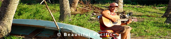 picture of Cook Island maori playing guitar