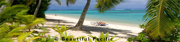 tourists sunbathing on a beach rarotonga island