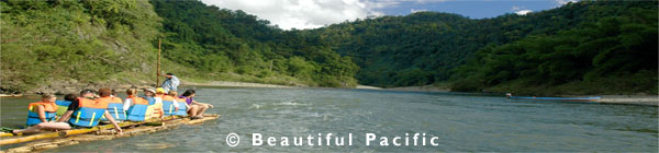 tourists rafting through Fiji rainforest