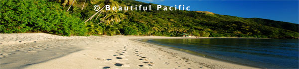 footprints leading to a backpackers beach resort