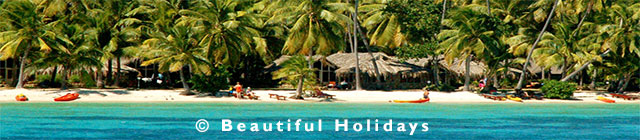 tourists enjoying a beach holiday in fiji