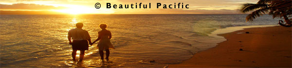 enjoying a sunset swim on a romantic holiday in fiji