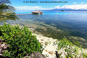 setting of aitutaki beach villas from lagoon